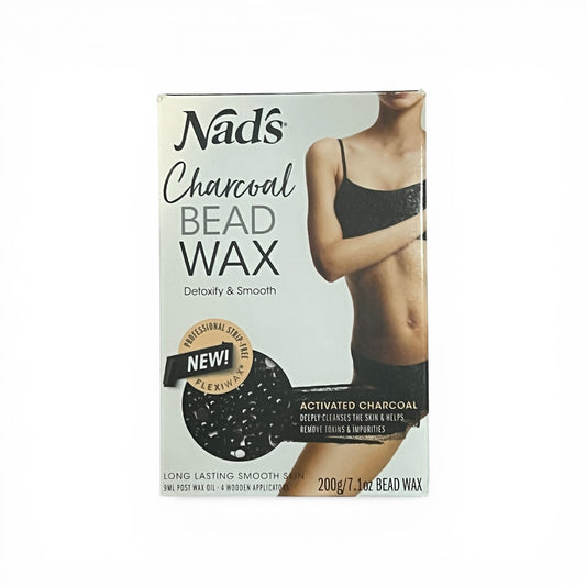 Box of Nad's Charcoal Bead Wax with a person wearing a black bra on a white background