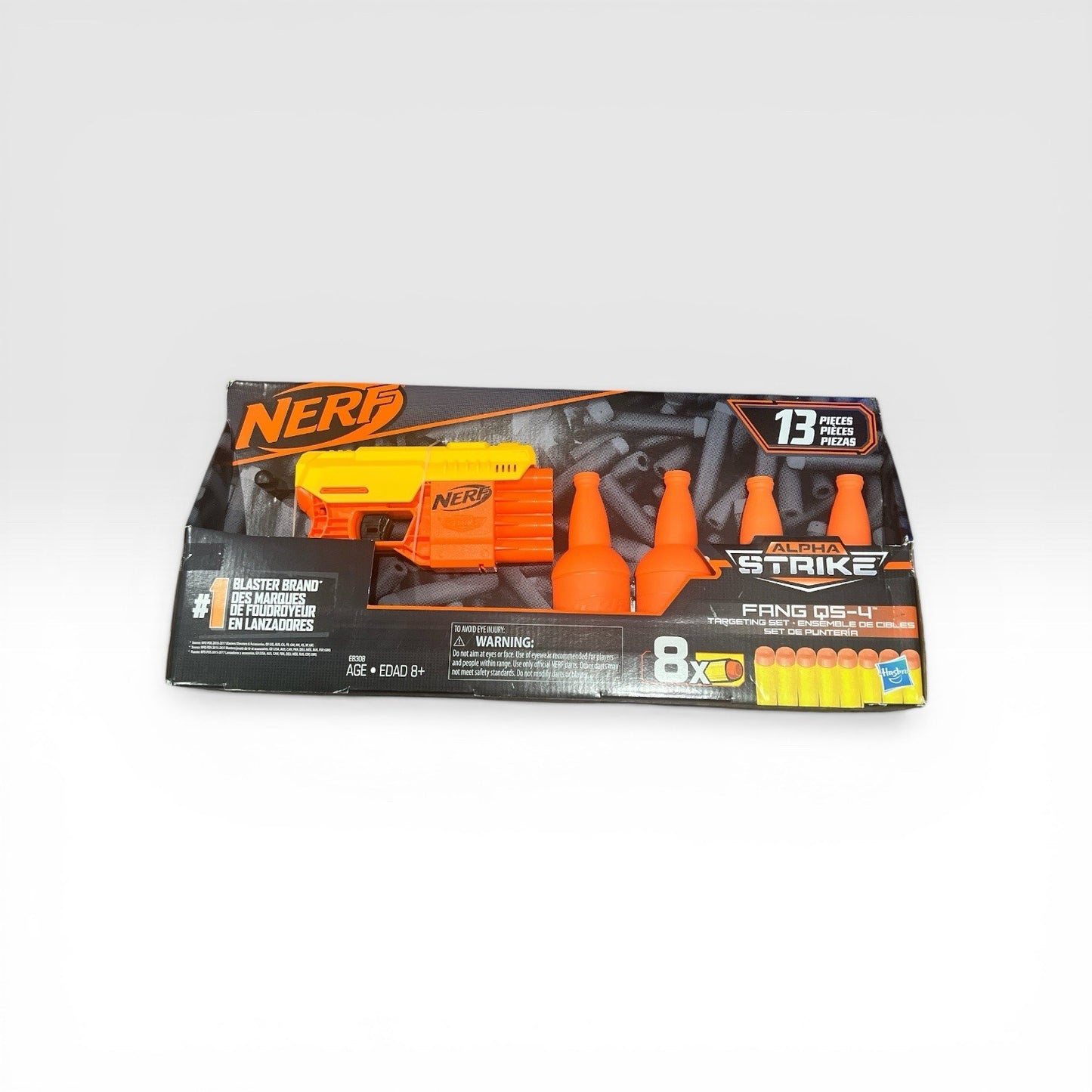 Nerf gun and dart pack on a white background